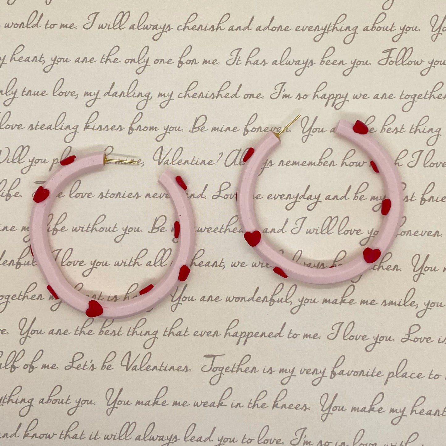 Pink hoops with hearts earrings